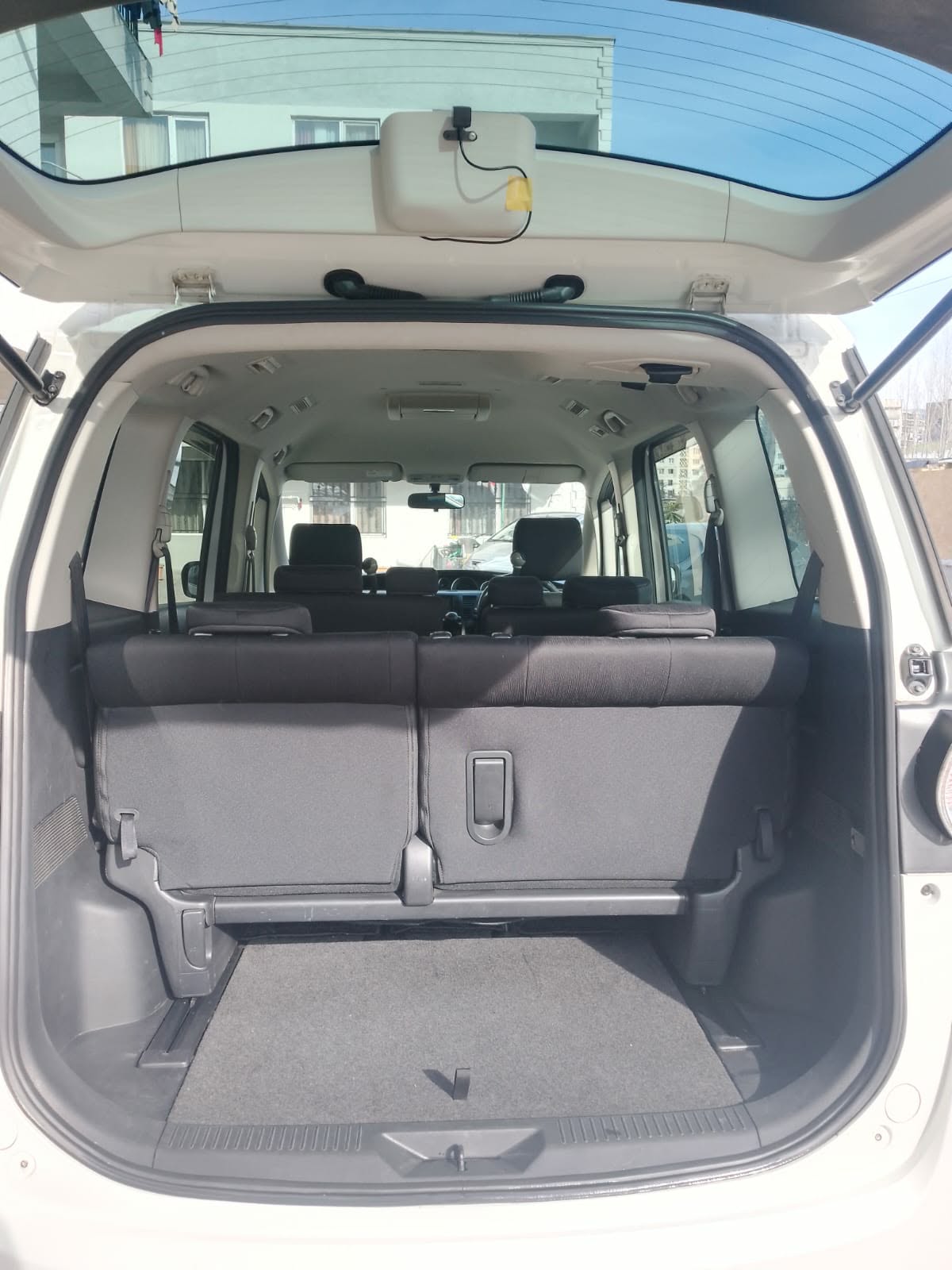 Luggage space in the back of the Mazda minivan